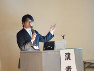 Photo of a Japanese man speaking